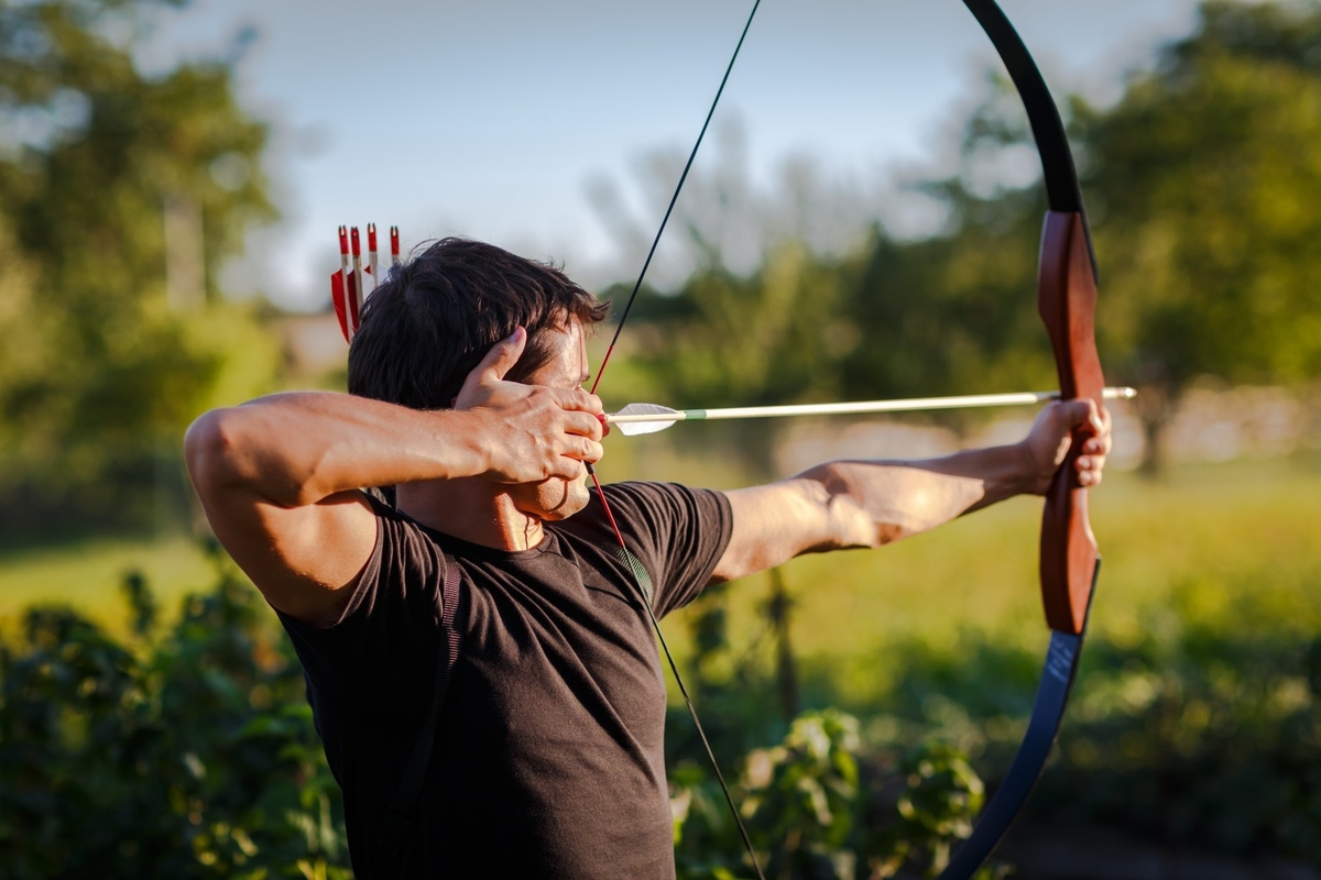 shooting bow and arrow