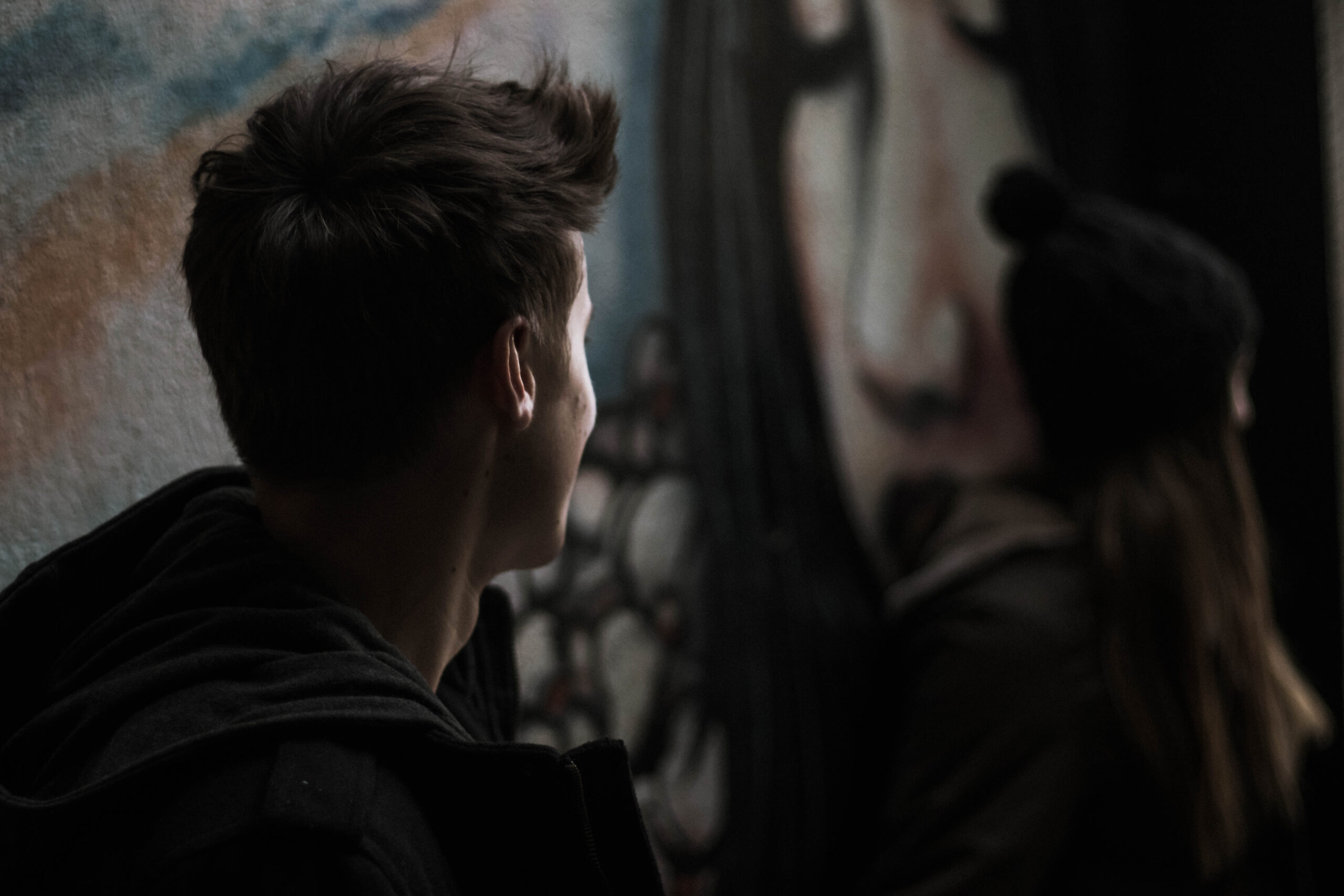 guy covering face with paln