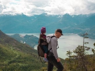 man walking with child