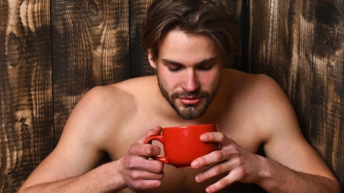 attractive man drinking tea coffee beard matcha tea