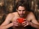 attractive man drinking tea coffee beard