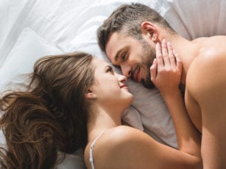 couple in love talking in bed