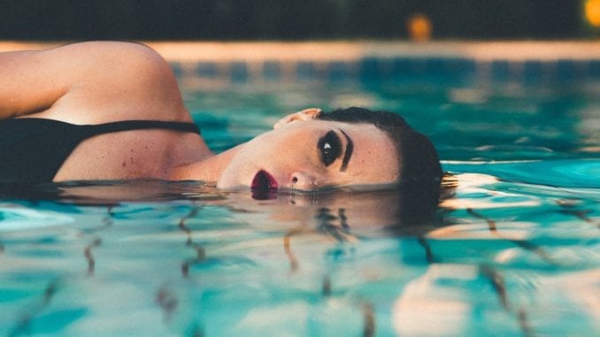 Woman taking a swim in a dream